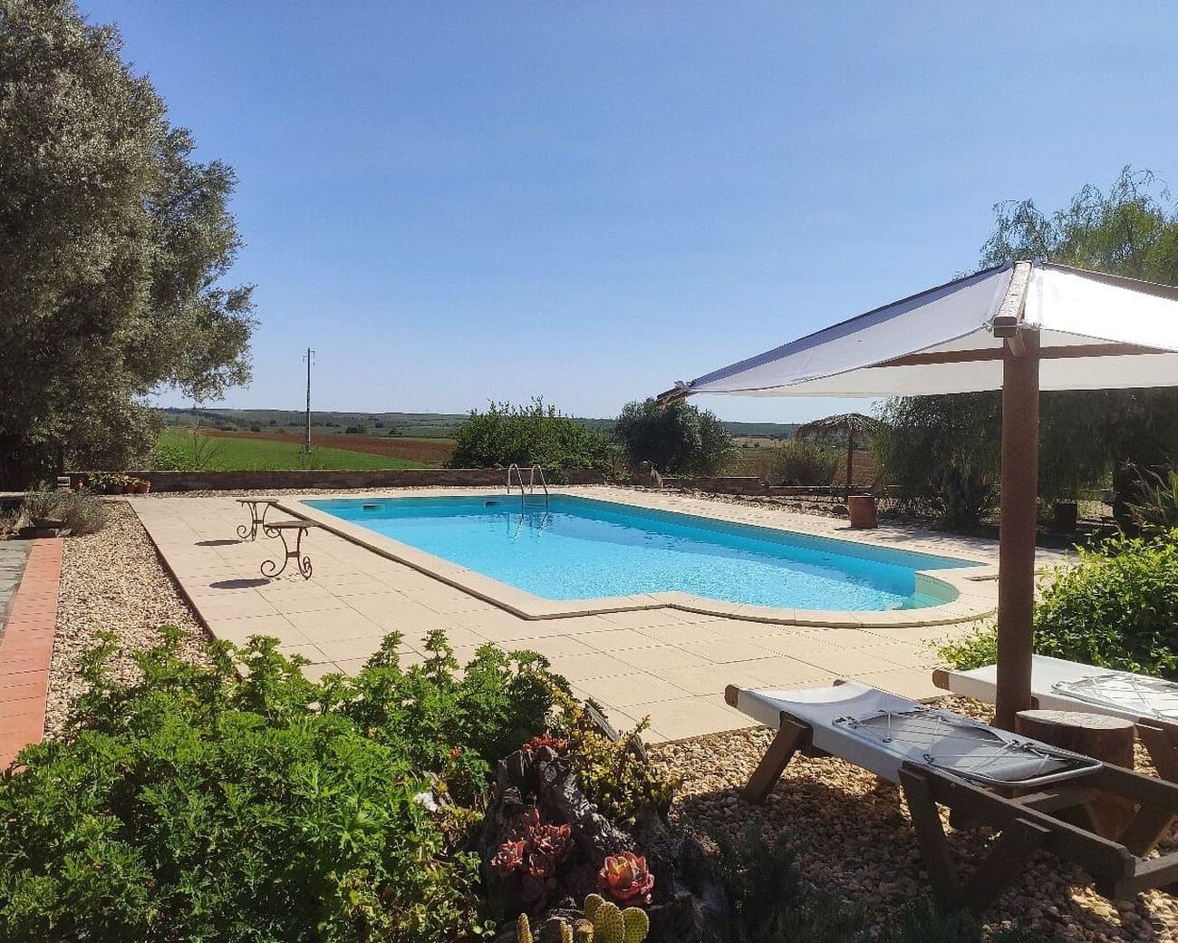 Quarto duplo com vista para a piscina no Monte da Floresta